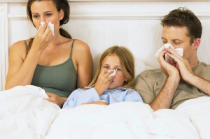 Sick family in bed