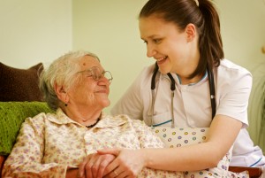 Helping a sick elderly woman